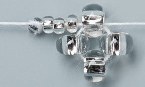 Beads looped on thread